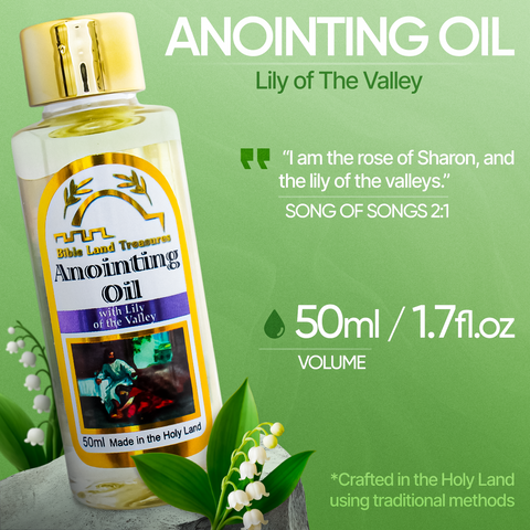 Bottle of anointing oil with lily of the valley fragrance on a green background
