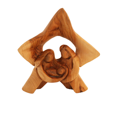 Wooden nativity scene sculpture on a white background