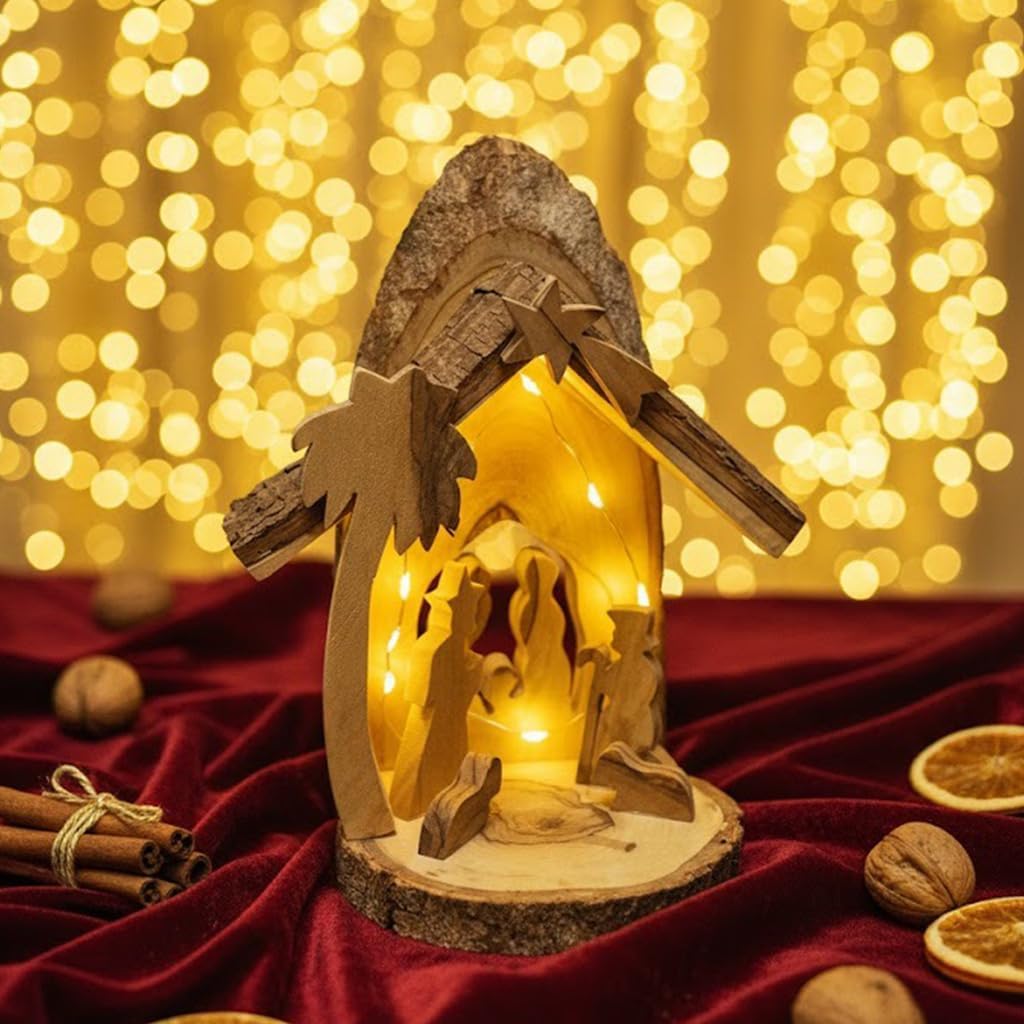 Wooden nativity scene with a light inside, set against a warm, blurred background.