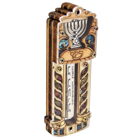 Top section of car mezuzah highlighting Star of David carving