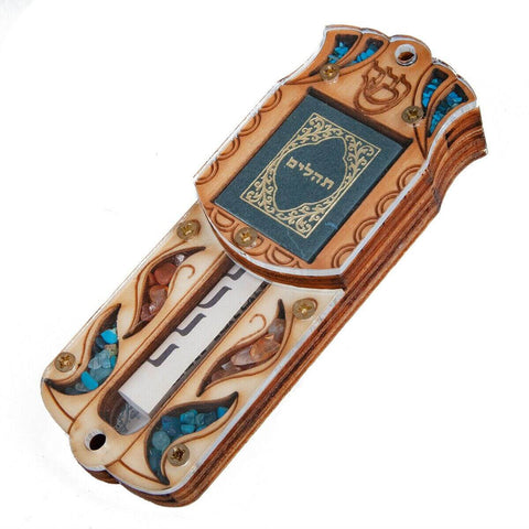 Detail of bail and stones on handcrafted wooden car mezuzah pendant
