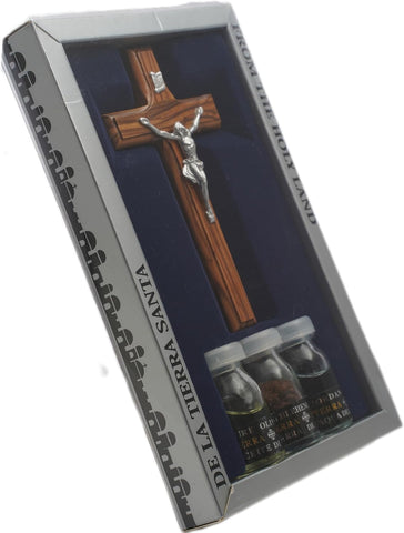 Christian devotional set with crucifix, olive oil, holy water, and Bethlehem soil