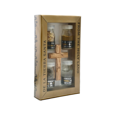 Angled display of gift set with incense and wooden cross
