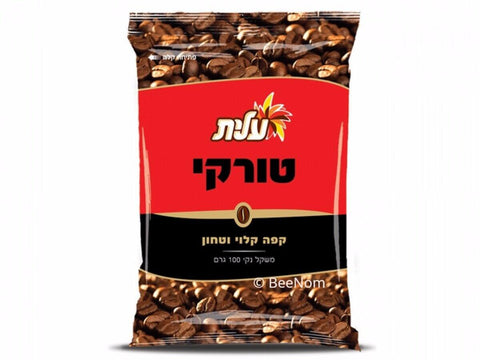 Detail of Elite coffee ground texture showing kosher marking
