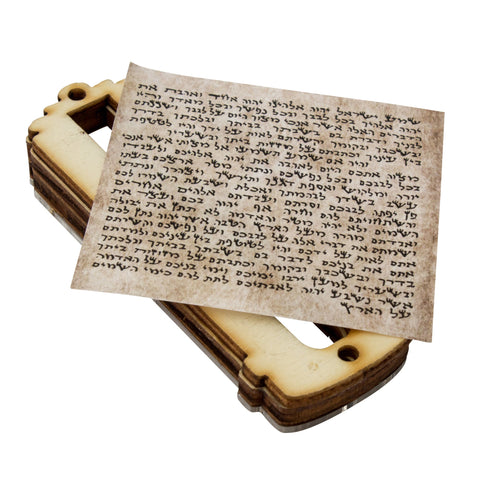 Inscribed Hebrew text detail on natural wood gemstone mezuzah