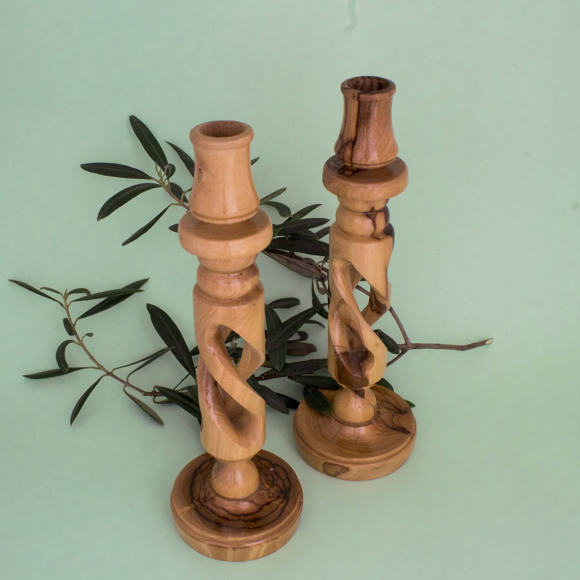 Pair of Holy Land olive wood candle holders with carved detail
