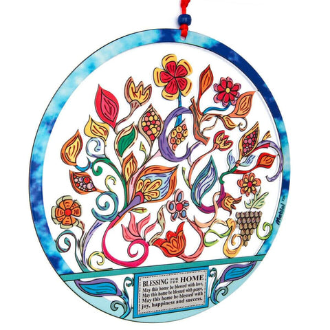 Angled view of hand painted metal home blessing with flowers