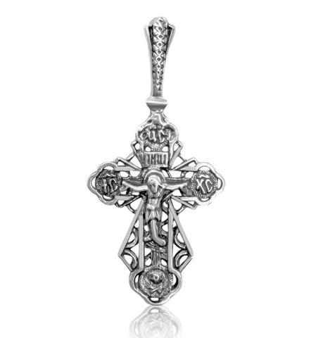 Catholic INRI crucifix necklace in sterling silver — shop now
