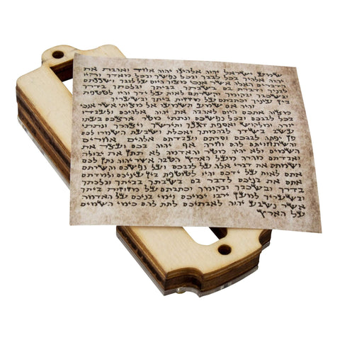 Mezuzah decorated with stones holding Shadai parchment