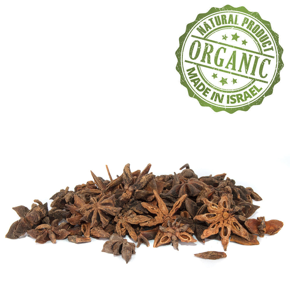 Dried whole star anise from Israel in a small glass jar.
