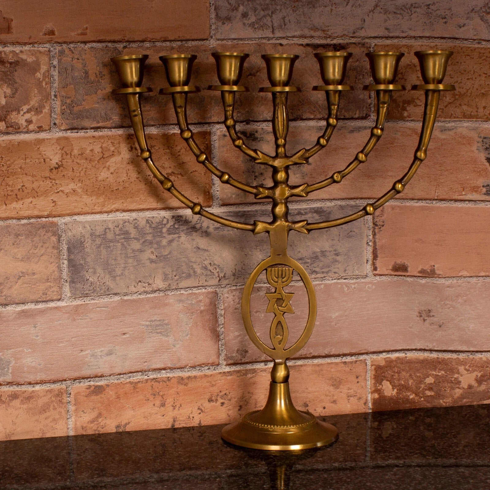 messianic menorah gold color with star of david details
