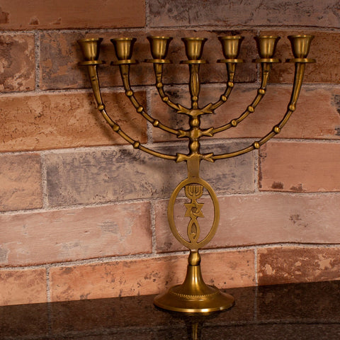 messianic menorah gold color with star of david details
