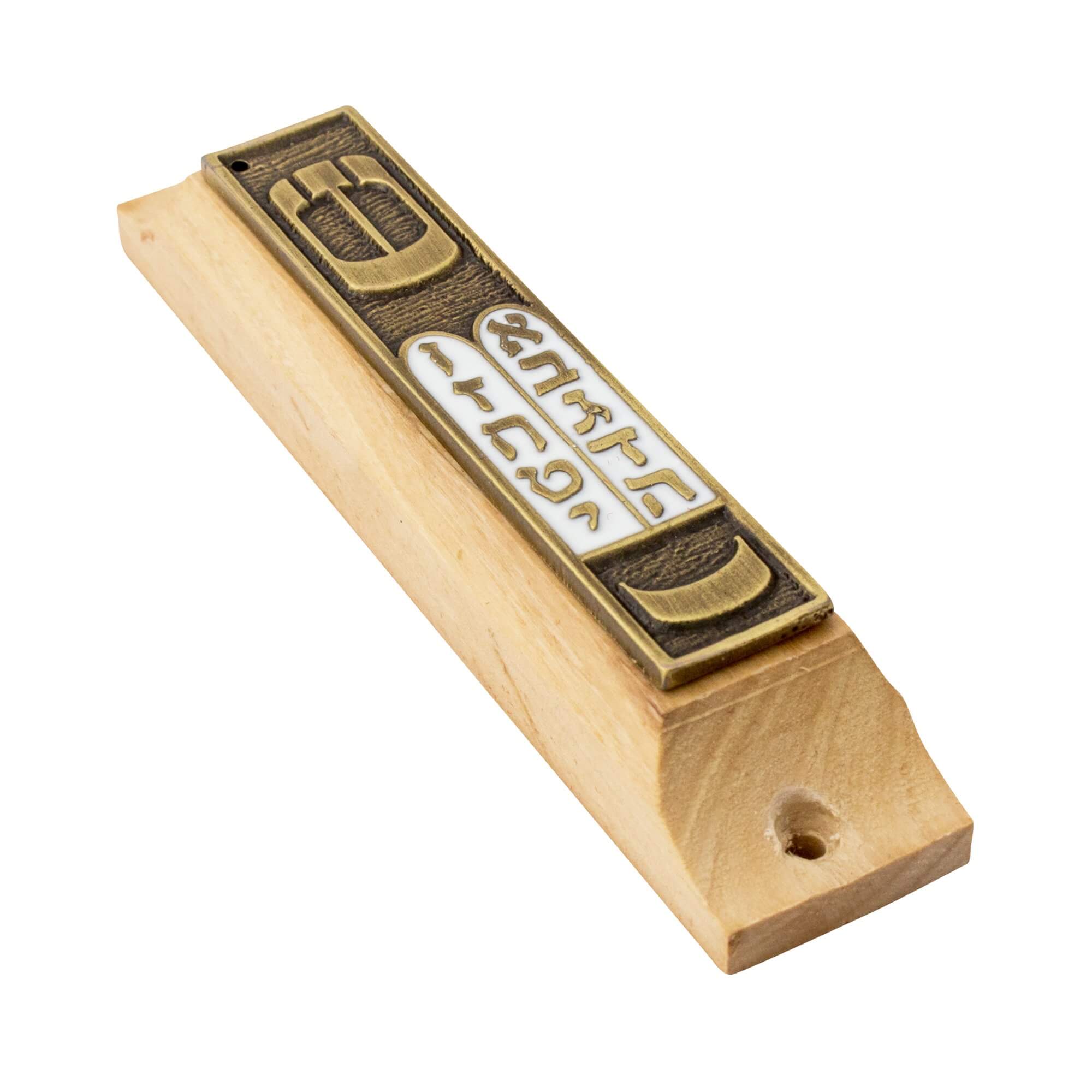 Close-up mezuzah scroll with Ten Commandments inside olive wood case