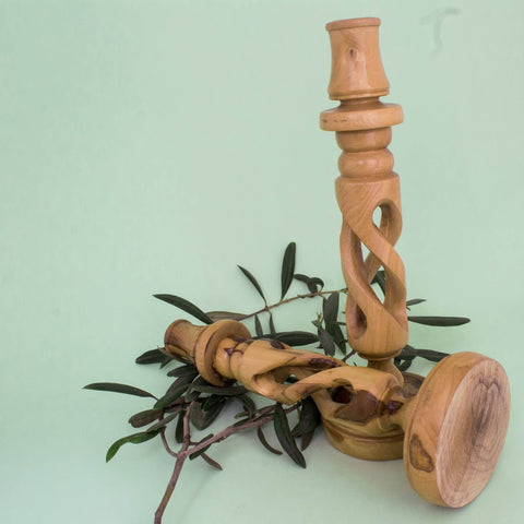 Close detail of natural olive wood grain on Bethlehem candle holders