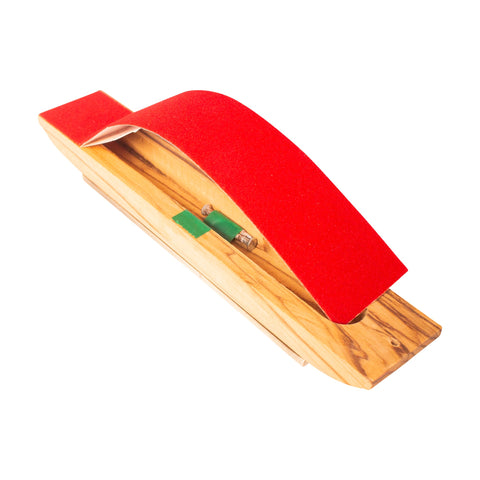 Back side of olive wood mezuzah case with polished surface
