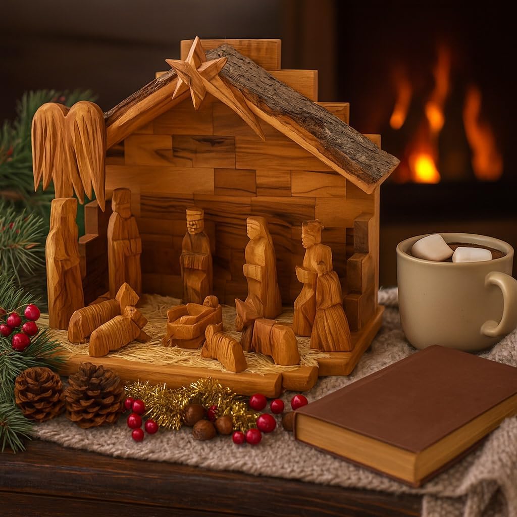 Wooden nativity scene with a cup of hot chocolate and book against a warm background