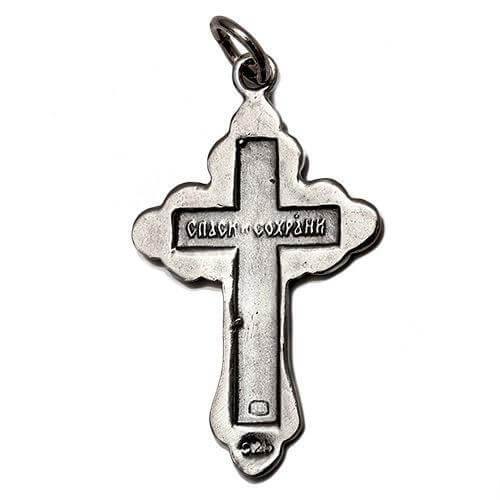 Reverse side of Orthodox silver cross pendant with detailed engraving
