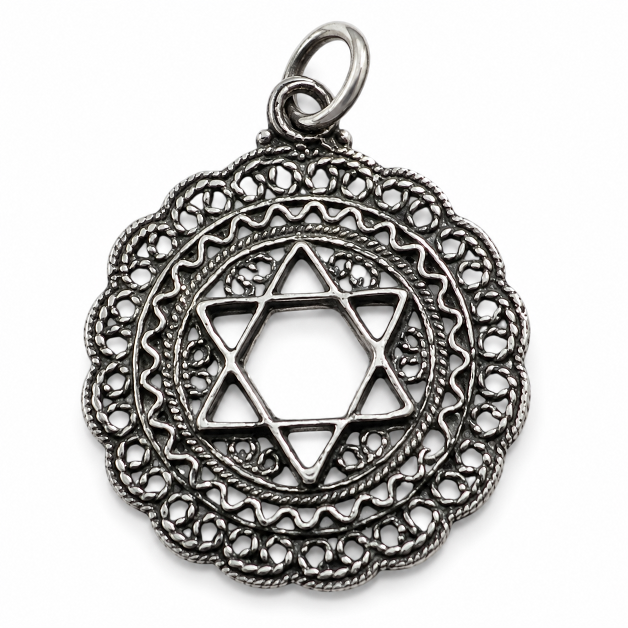 Front-view silver-tone Star of David pendant with dark oxidized details, openwork filigree, scalloped circular border, textured rope accents, and a hanging ring on a white background