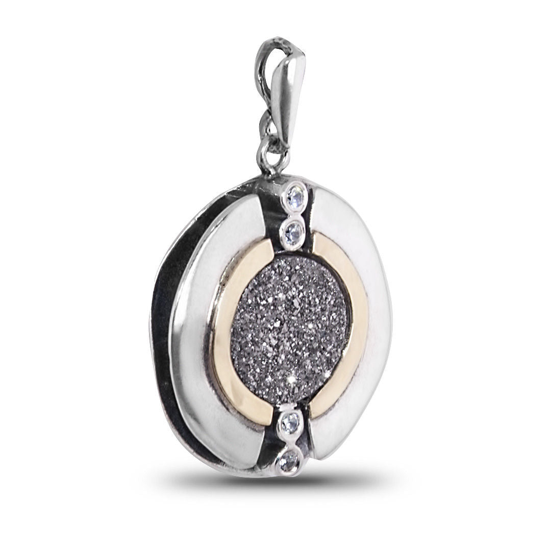 Reverse side of silver pendant and ring from Israel craftsmanship