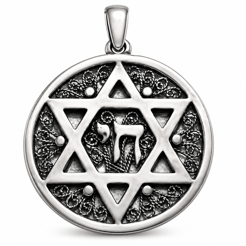 Front view of a round silver-tone pendant with a raised Star of David, central Hebrew Chai symbol, dark oxidized filigree details, polished bail, and soft shadow on a white background.