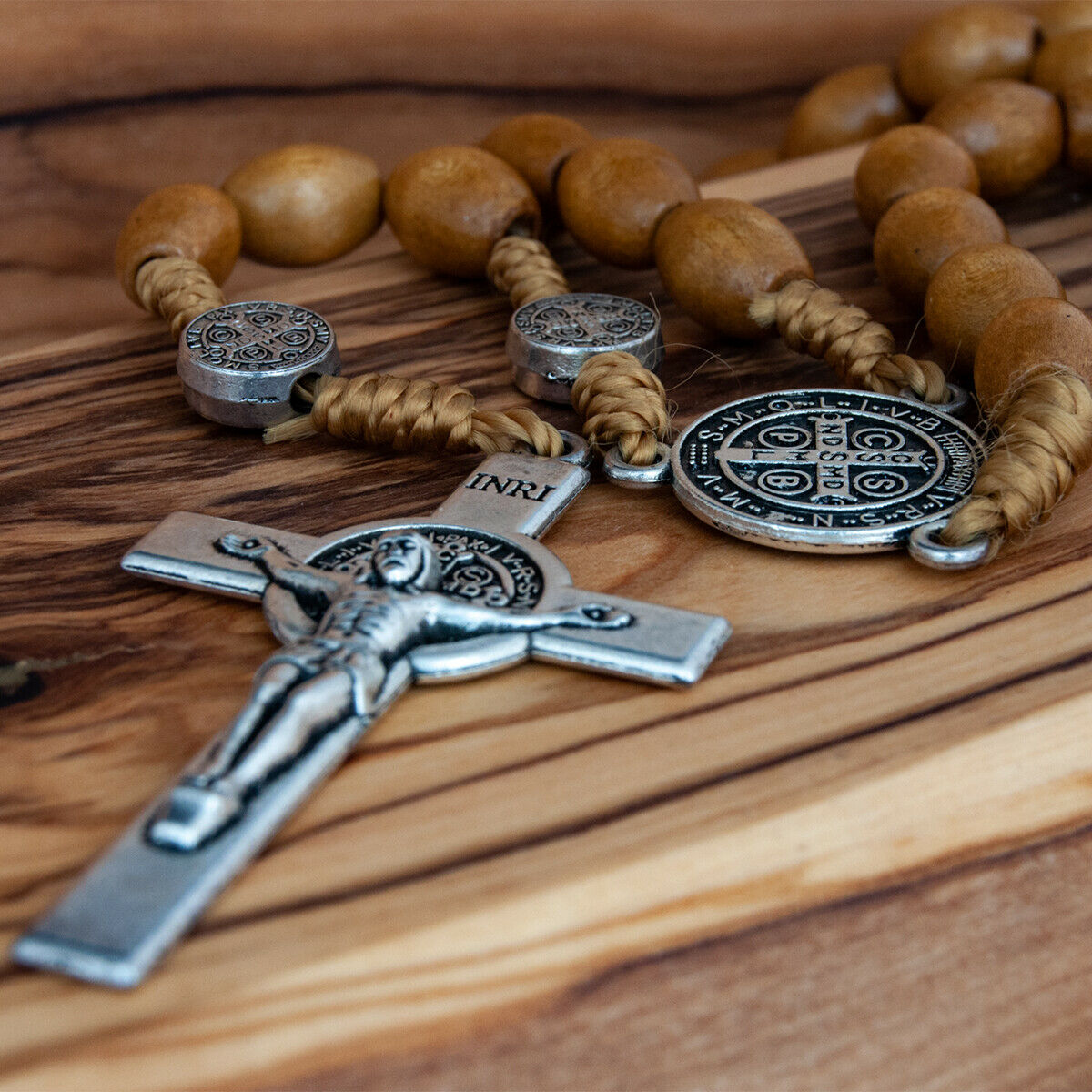 Inscription detail on St. Benedict crucifix rosary necklace