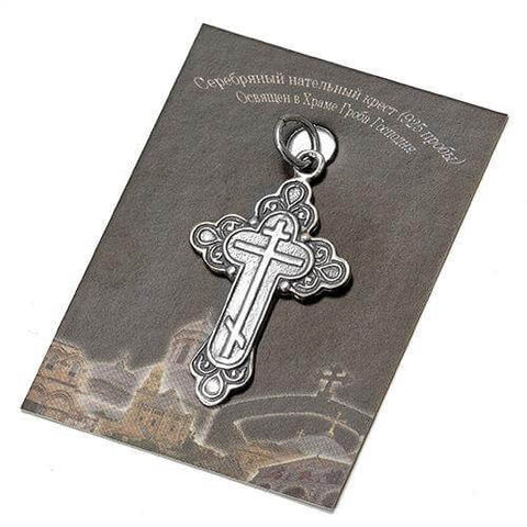 Angled front of sterling silver cross necklace with Holy Land design
