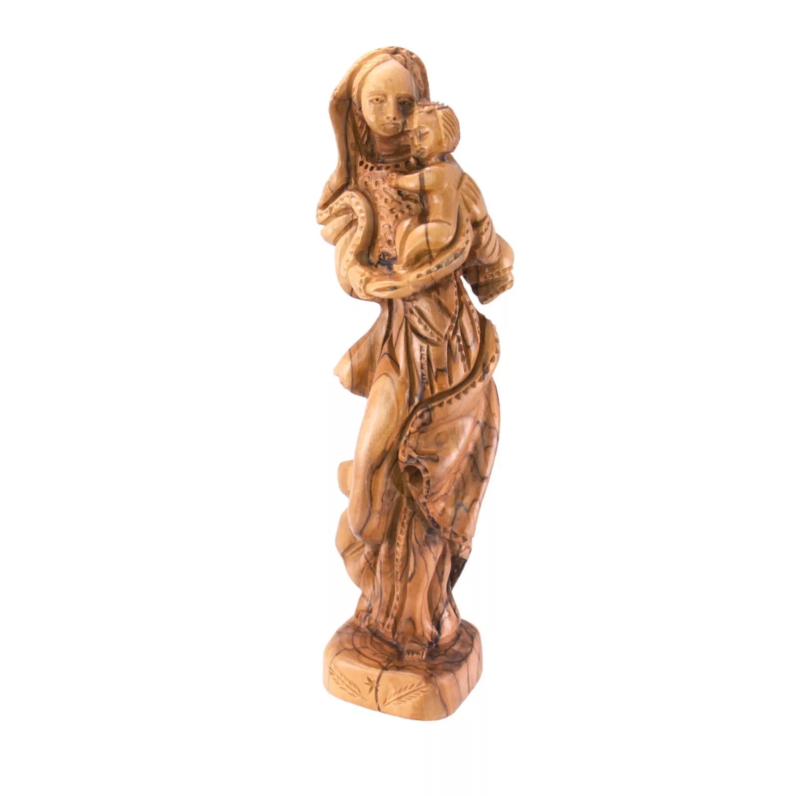 Close-up of detailed craftsmanship on baby Jesus olive wood statue
